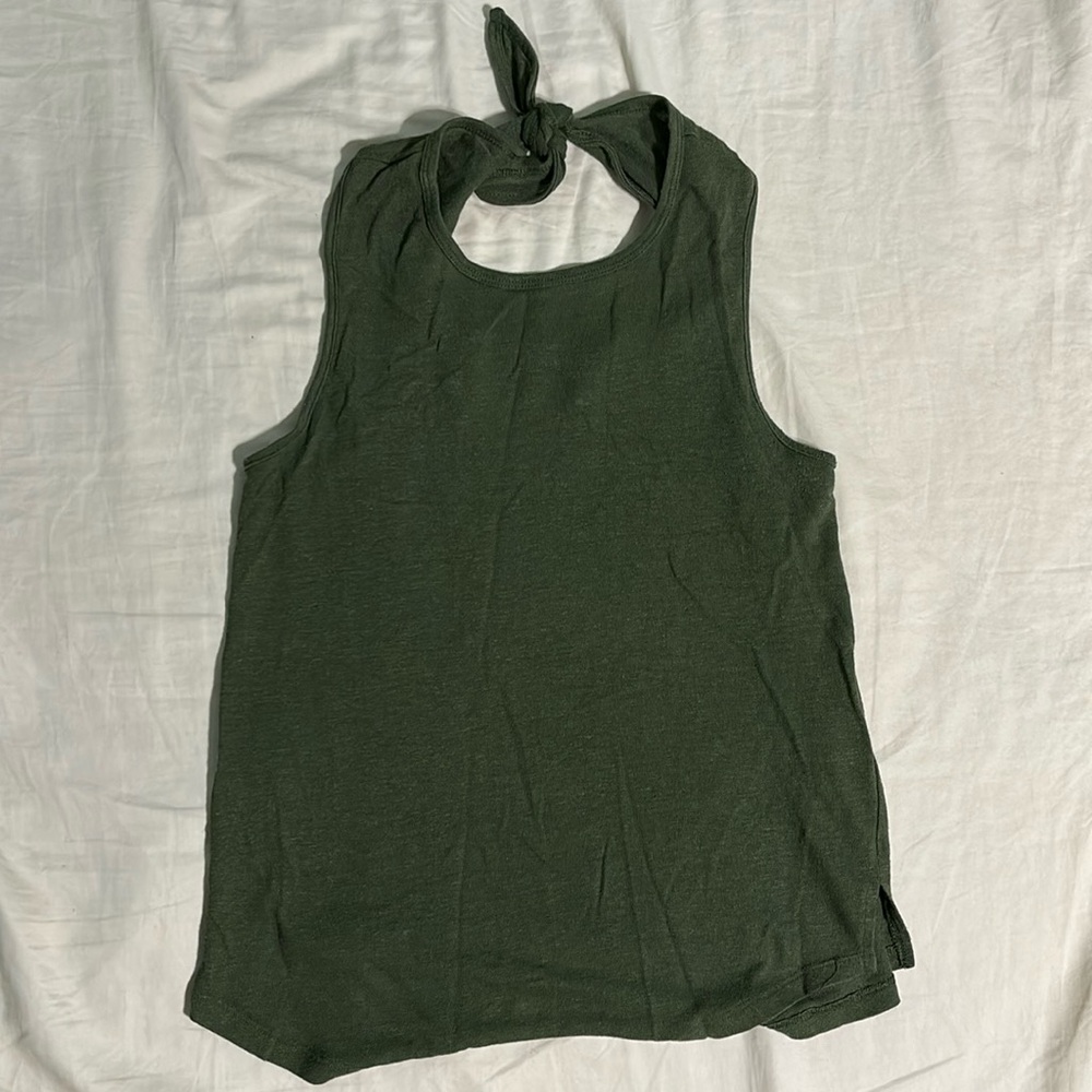 Sleeveless green tank top, ties in back, lightly worn, size S